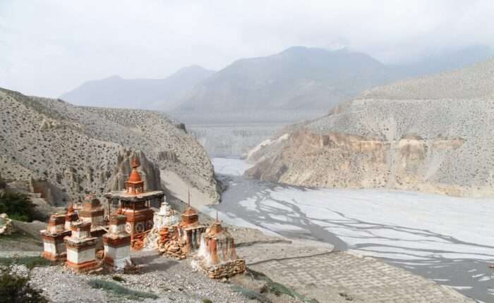 Upper Mustang Jeep Tour buddhist-stupas-on-rock-near-valley